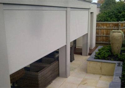 White external blinds have wound down installed in big windows